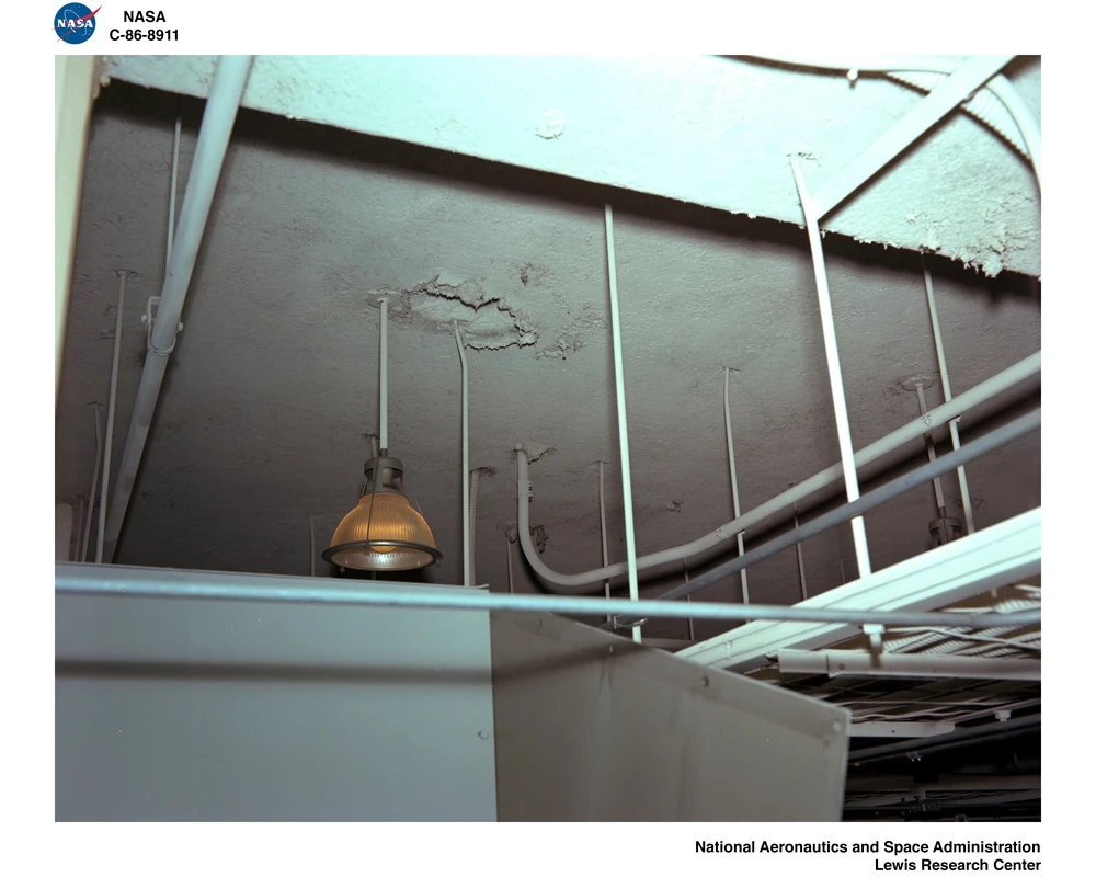 Ceiling insulation identified as asbestos in a NASA archival photograph